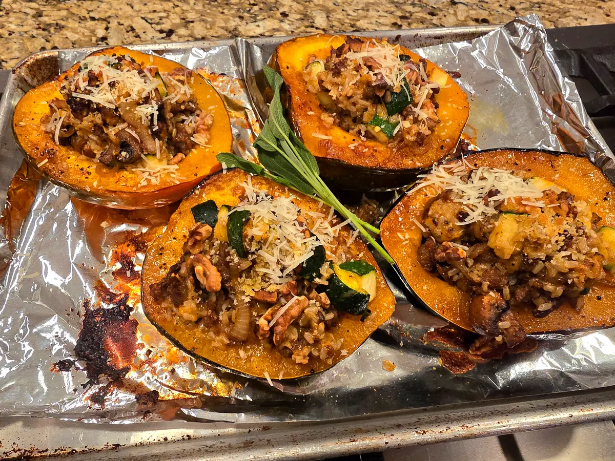 Brown Rice & Italian Sausage Stuffed Acorn Squash with Sage, Walnuts, and Maple Glaze